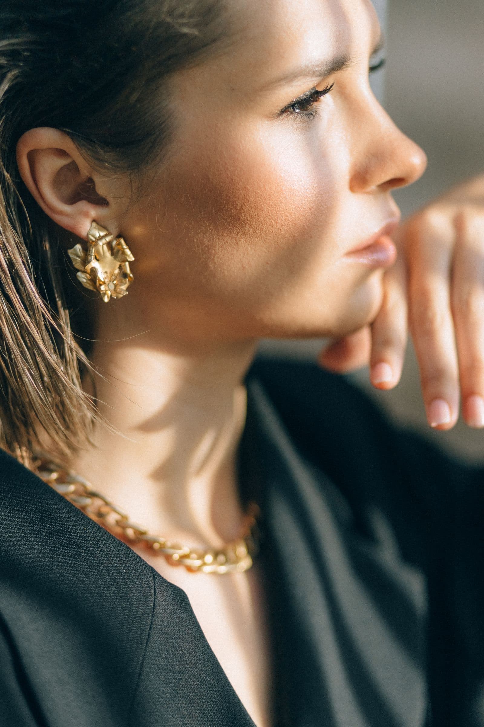 Soft sunlight, golden details, and the beauty of handmade jewelry